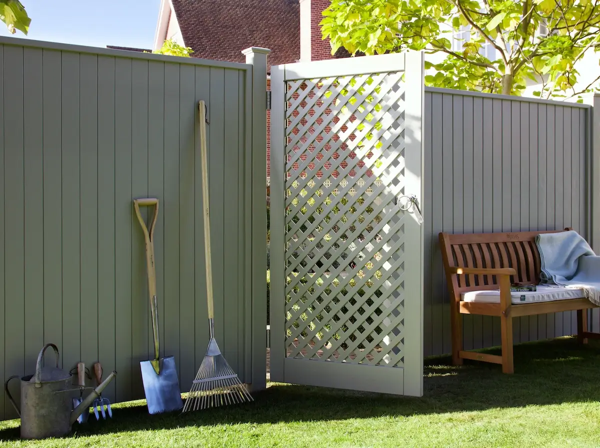 RHS Tongue and Grove Fence Panels and Diagonal Trellis Gate in Manhattan Grey with Burgon and Ball Tools and Kettler Bench