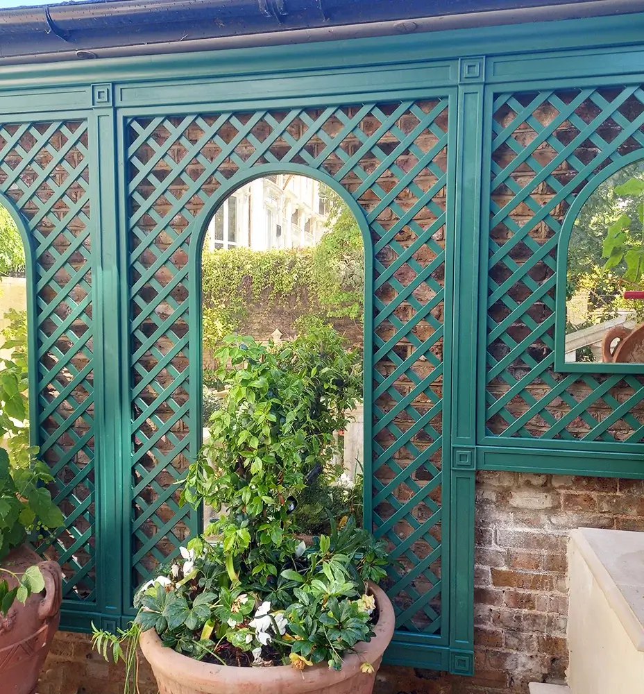 Bespoke Mirrored Diagonal Trellis Panels (with a 68mm gap) painted in Alpine