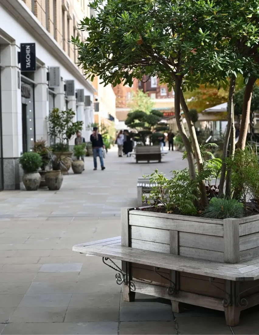 Iroko planter and bench in Duke of York Square, London