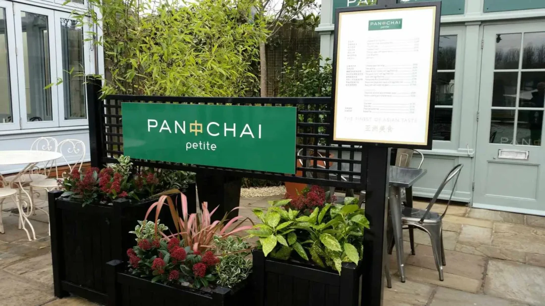 Bespoke black planters and fence panels - Pan Chai petite at Bicester Village, Oxfordshire