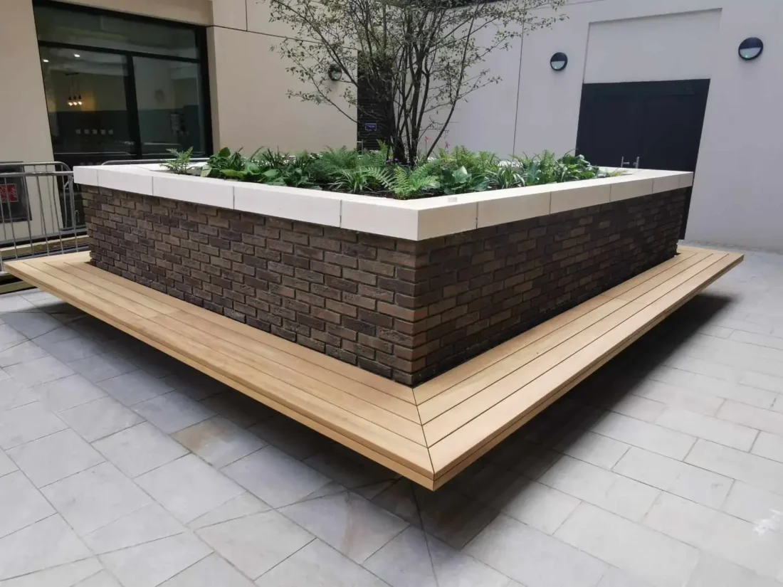 Bespoke Iroko bench with brackets - London