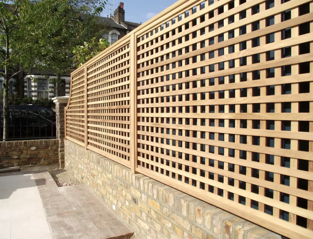 Iroko trellis with arched panel to finish