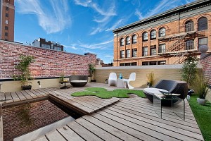 Contemporary-Outdoor-Garden-Chairs-with-Unique-Design-on-the-Wooden-Floor-in-Roof-Top-with-Building-View