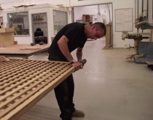 Hand making one of our Iroko panels