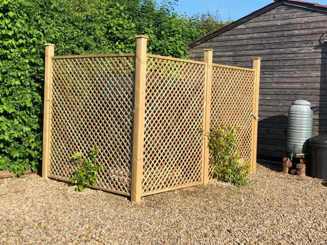 Natural diagonal trellis used to cover an oil tank