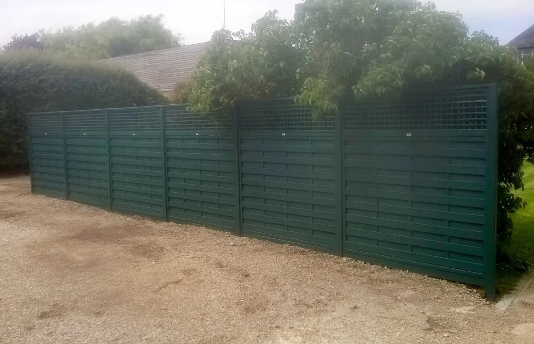 Painted Solid Fence Panels with Square Trellis Panels installed above