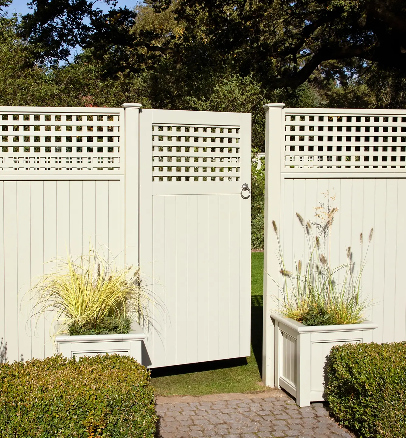 GTC RHS Tongue Grove Fence Panels and Diagonal Trellis Top Gate in Manhattan Grey with Traditional Planters